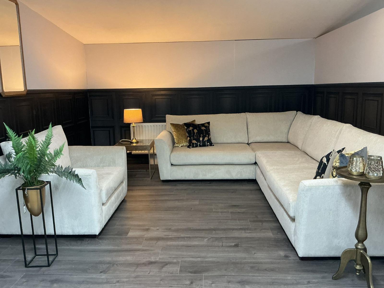 Large cream corner suite with matching armchair