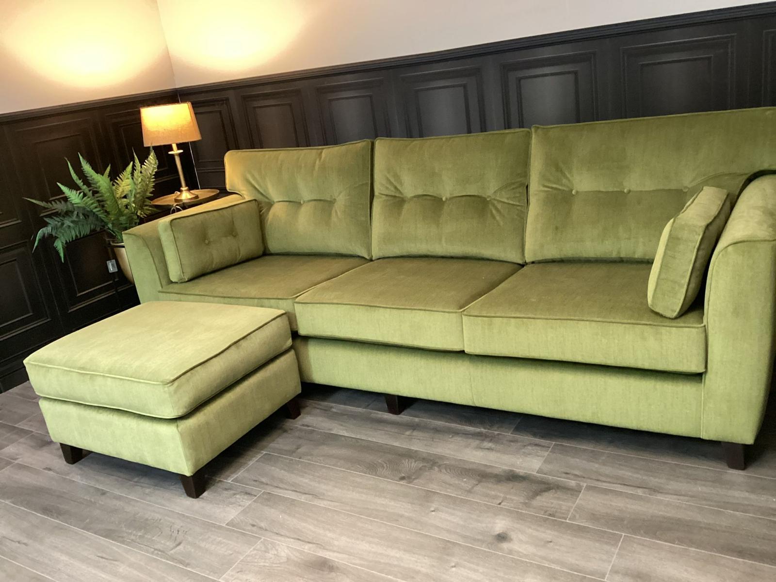 Olive green sofa with matching footstool